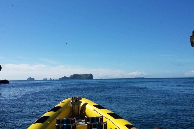 1-Hour Small Group Sightseeing Boat Tour in Vestmannaeyjar - The captain and guide factor: music, stories, and real island context