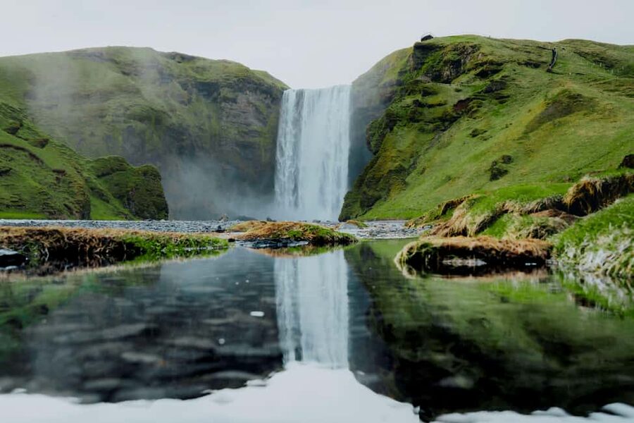 From Reykjavík: 2-Day South Coast Adventure - Reynisfjara black sand, basalt columns, and the views toward Dyrhólaey