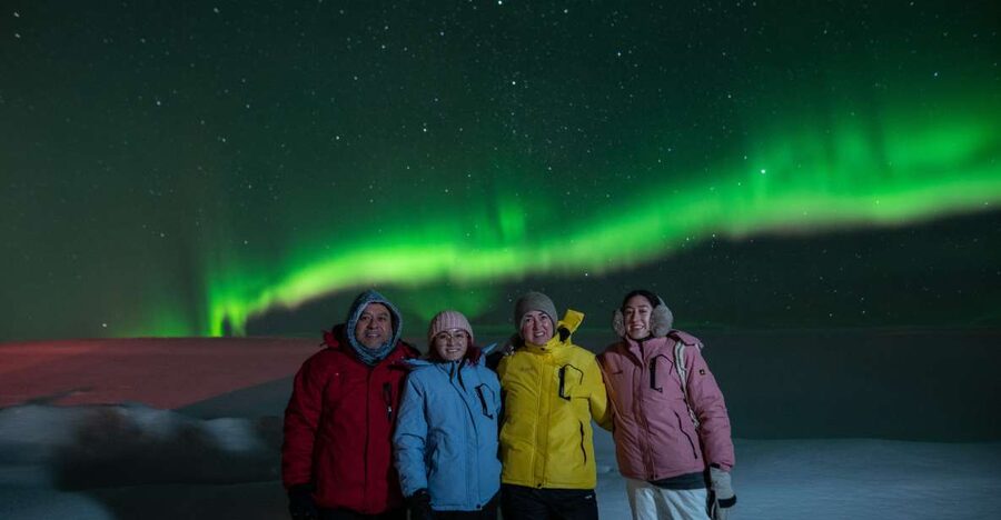 From Reykjavik: Northern Lights Guided Tour with Photos - From downtown Reykjavik to darker skies, the first part matters