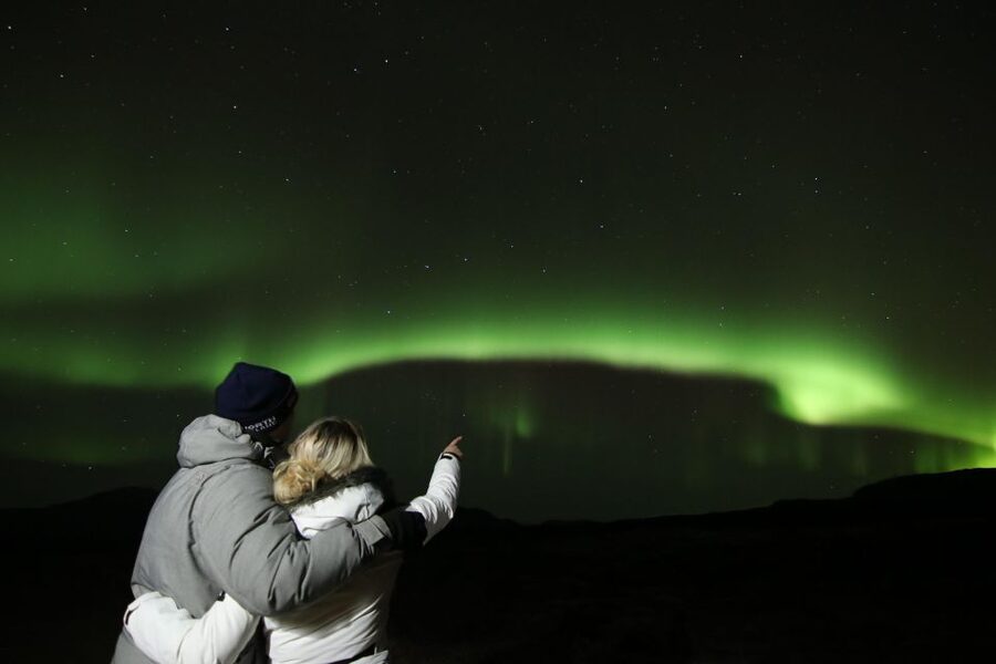 From Reykjavik: Northern Lights Tour with Hot Cocoa & Photos - How guides chase the Northern Lights using forecasts and quick stop decisions