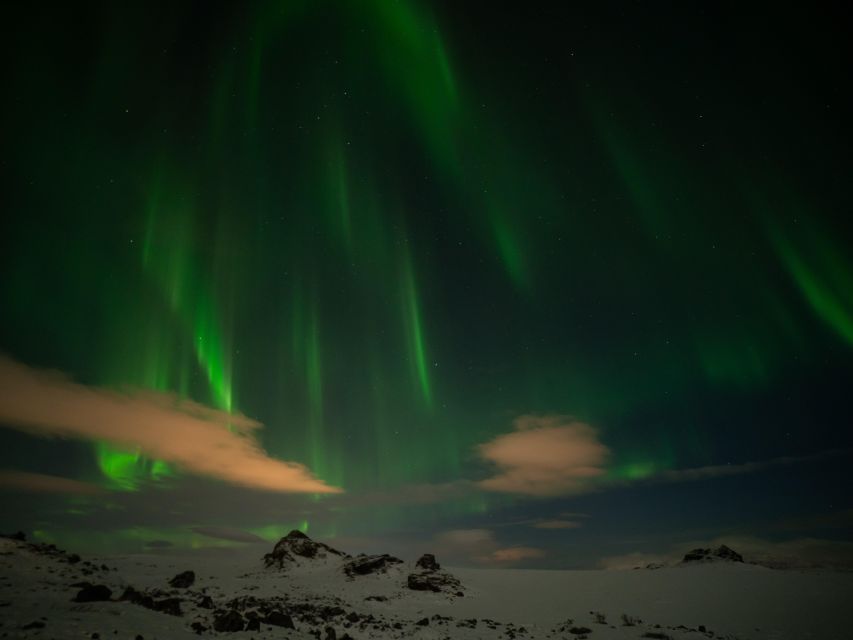 From Reykjavik: Northern Lights Tour with Hot Cocoa & Photos - The secret stop and the value of multiple chances outside city lights