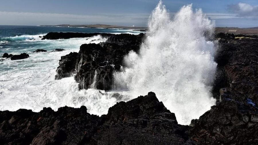 From Reykjavik: Reykjanes Geopark Tour & Airport Transfer - Reykjanesviti lighthouse and bird cliffs: ocean views that cool your senses