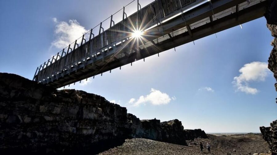 From Reykjavik: Reykjanes Geopark Tour & Airport Transfer - Bridge Between the Continents: the symbolic tectonic line you walk across