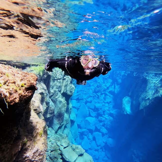 From Reykjavík: Silfra Snorkeling with free photos - Snorkeling at Silfra Fissure, where the continents drift apart