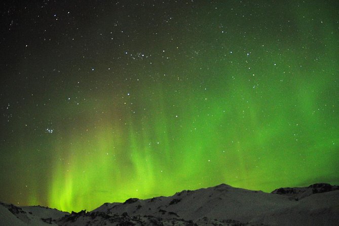 Northern Lights Minibus Tour with Hot Cocoa, Blankets & Photos - Leaving Reykjavik Light Pollution Behind, the Minibus Way