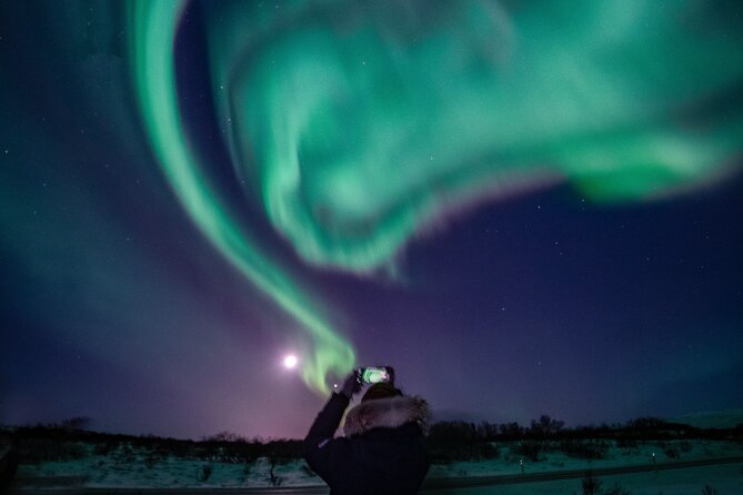 Northern Lights Small-Group Tour with Hot Chocolate & Photos - Photos: The Best-Case Scenario and the Fair Warning