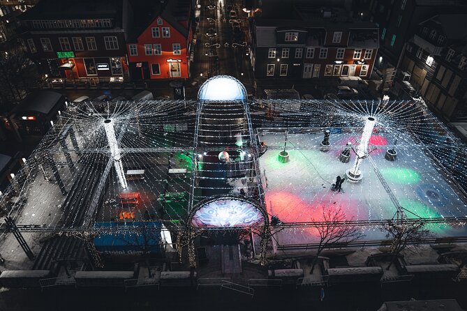 Reykjavik Christmas Walking Tour - Ingólfstorg and Ingólfur Square: lights, ice rink energy, and market stalls