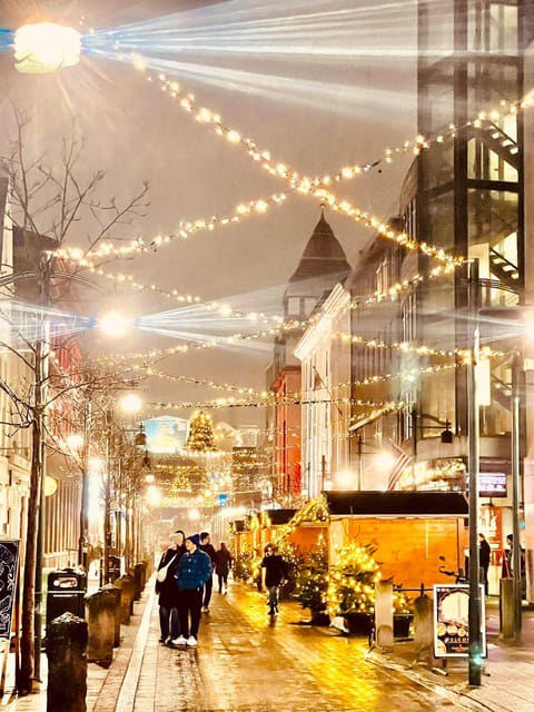 Reykjavik: Christmas Walking Tour with Icelandic Traditions - Ingólfur Square: ice skating, holiday decorations, and market stalls