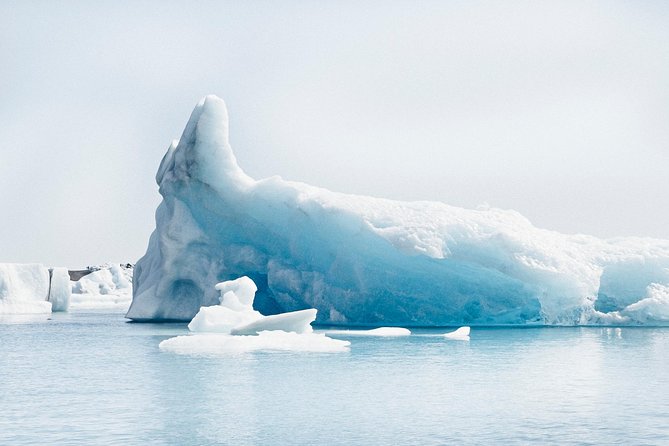 Reykjavik: Glacier Lagoon Boat Ride & South Coast Full Day Tour - Diamond Beach on Black Sand: Photos, Footing, and Tide Awareness