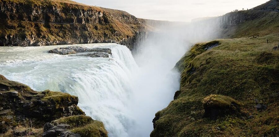 Reykjavik: Golden Circle Super Jeep Tour with Snowmobiling - Langjökull Glacier snowmobile ride: gear, license, and the one-hour thrill