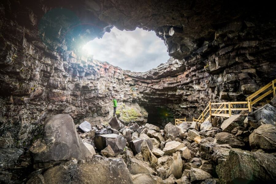 Reykjavik: Lava Cave, Hot Springs, and Waterfalls Tour - Hraunfossar and the nearby Barnafoss: why water looks surreal here