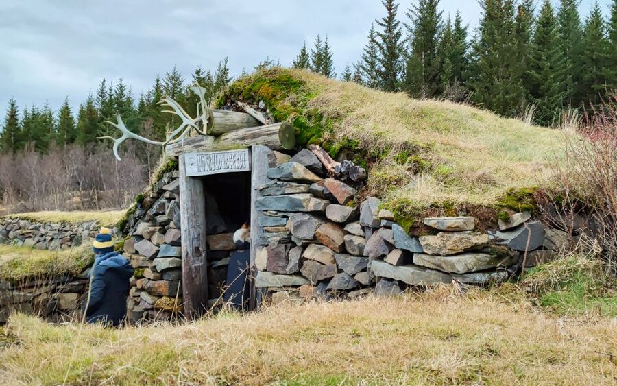 Reykjavik: Lava Cave, Hot Springs, and Waterfalls Tour - Húsafell break and shopping stop: give your feet a reset