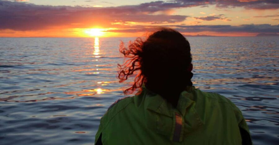 Reykjavík: Midnight Sun Whale Watching Cruise - Onboard comfort: overalls, decks, restrooms, and why it changes your mood