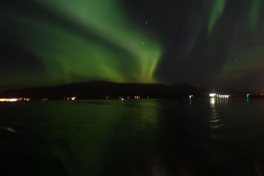 Reykjavik: Northern Lights Guided Boat Tour - Entering The Old Harbour, then Leaving the City Glow