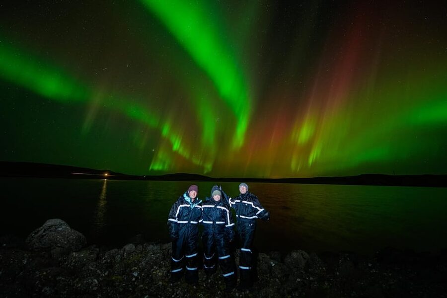 Reykjavik: Northern Lights Tour with Private Photographer - Small Group Comfort: Max 18, Jumpsuits, and Outdoor Chairs