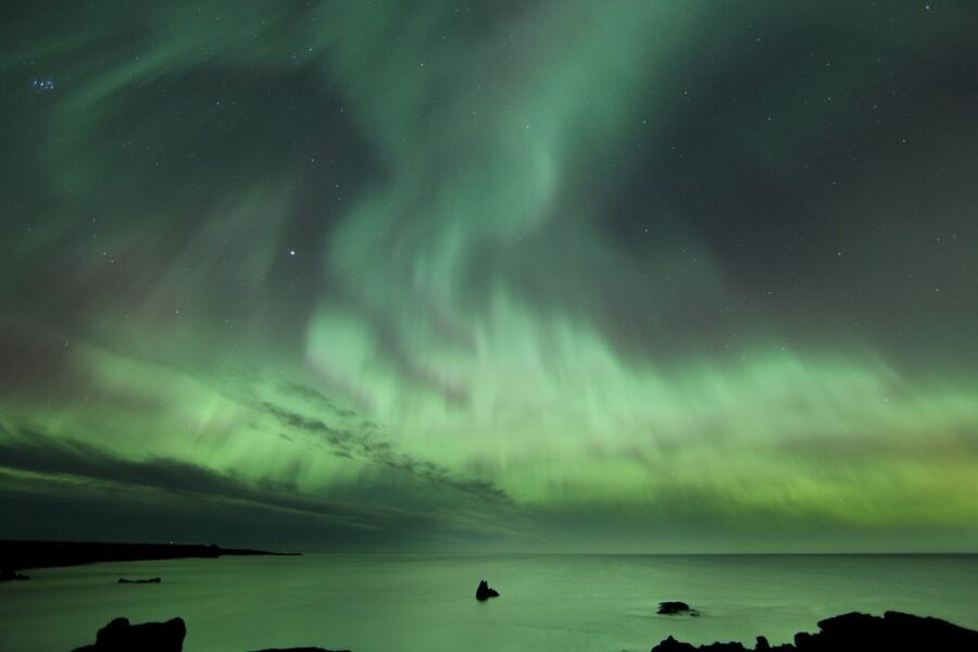 Reykjavik: Small Group Northern Lights Tour - Real-World Considerations: Pickup Details, Snacks, and Group Size Changes