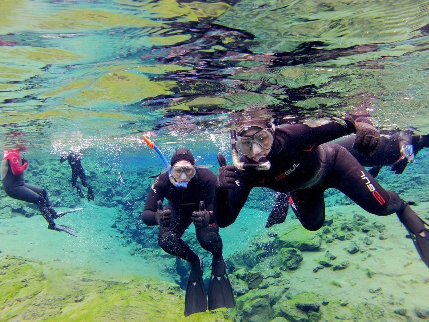 Silfra: Half-Day Snorkeling Day Trip with Underwater Photos - The lagoon finish, photos, and hot chocolate after your snorkel