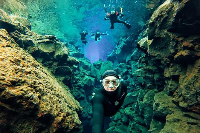 Silfra Wetsuit Snorkeling - Meet on Location | Free Photos - Entering Silfra: safety briefing, controlled snorkeling, and that surreal visibility