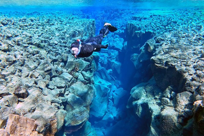 Silfra Wetsuit Snorkeling - Meet on Location | Free Photos - The photo advantage: free underwater shots and why it changes the value