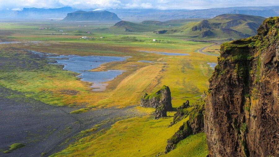 South Coast of Iceland. Black beach, glaсier, waterfalls... - Reynisfjara black sand beach near Vík: basalt cliffs and sea stacks