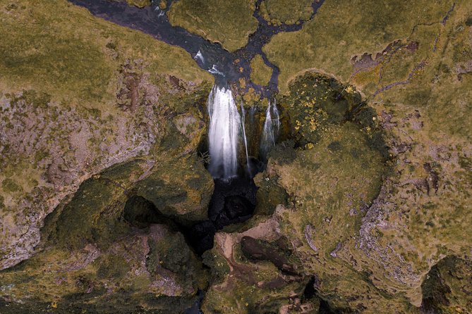 South Coast Sagas: Small Group Tour with Pick-up from Reykjavik - Stop 3: Skógafoss, the wide waterfall that forces you to slow down