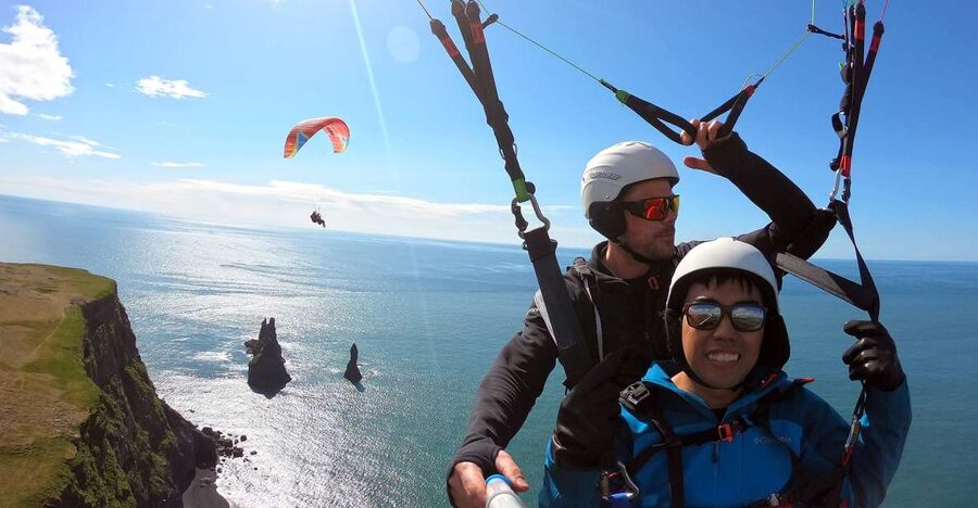 Vík: Paragliding Tandem Flight - The 1 Hour Flow, Jeep Ride, Vik Photo Stop, and the Flight Window